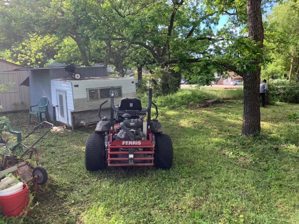 Cleanup in Progress by Yard Sharks Property Services
